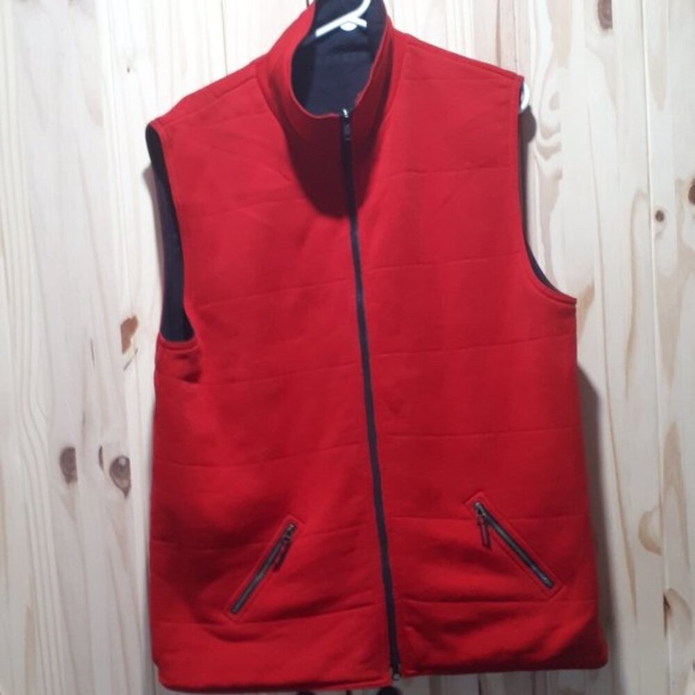 Spanner Sport two sided vest red one side and black the other side insulated.